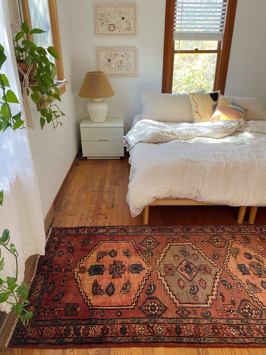 Enhance a Bedroom Scene with Earthy Toned Vintage Persian Rug