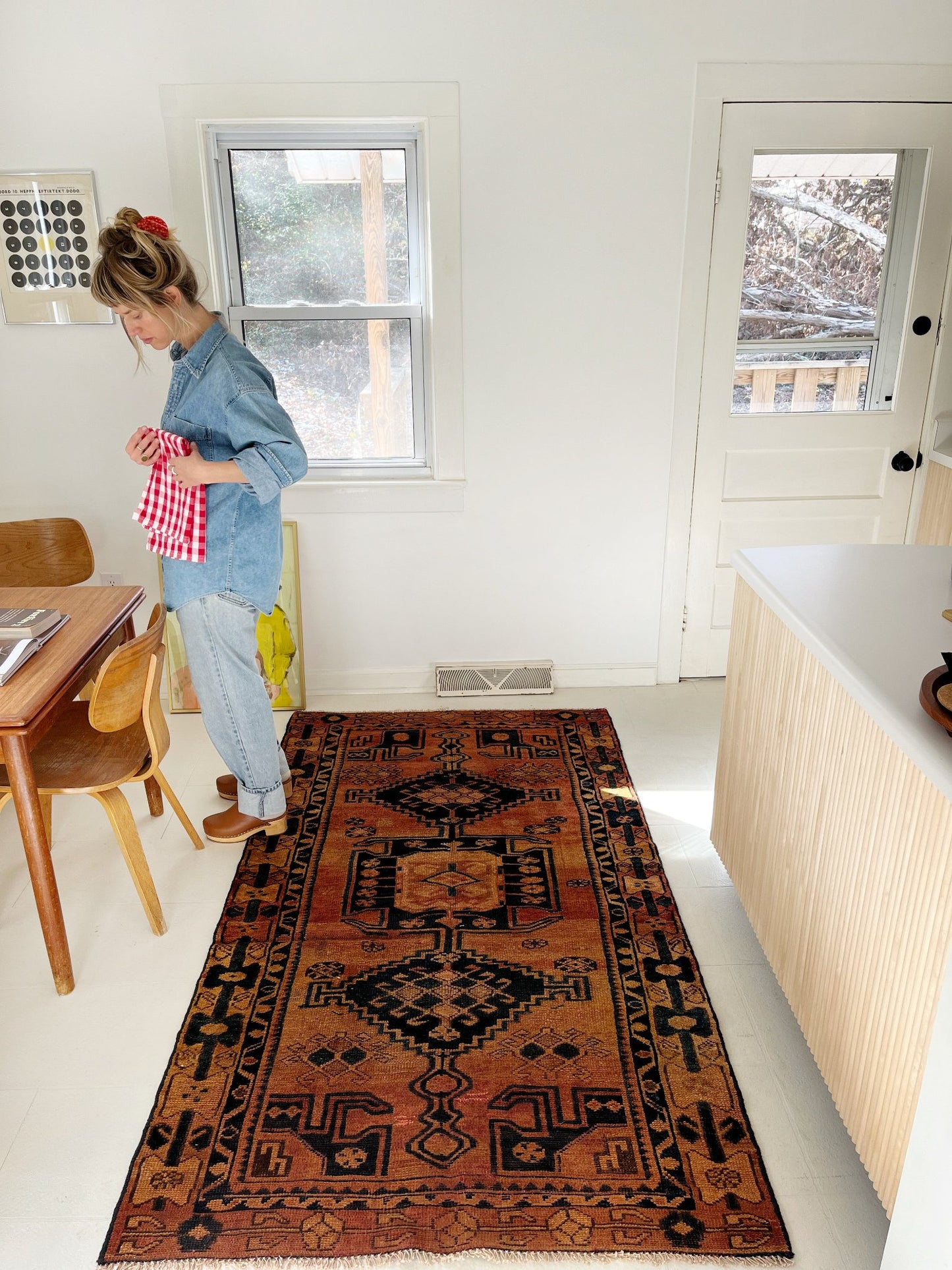 Style a Vintage Persian Area Rug in a Dining Room