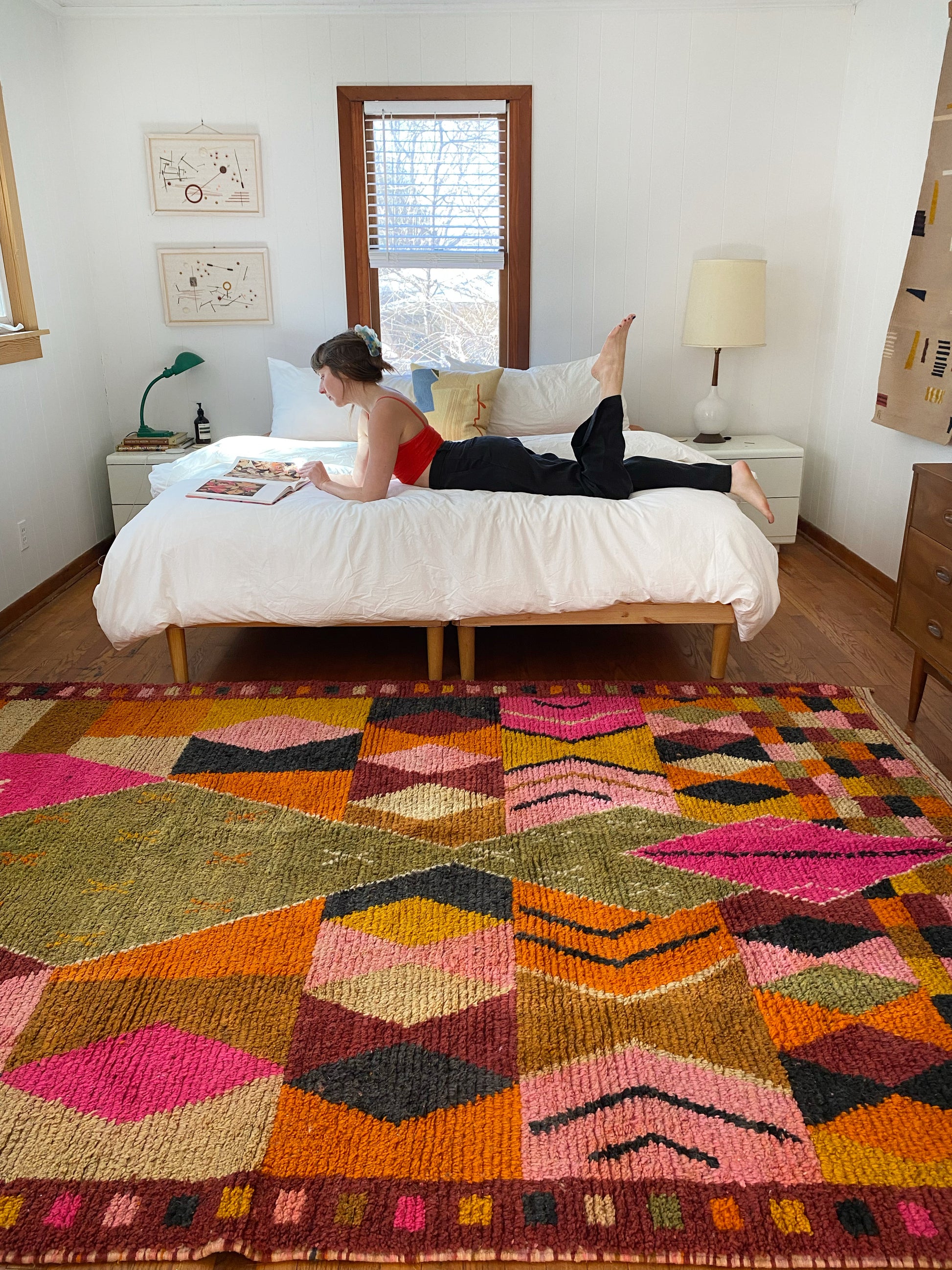 Moroccan area rug styled in bedroom