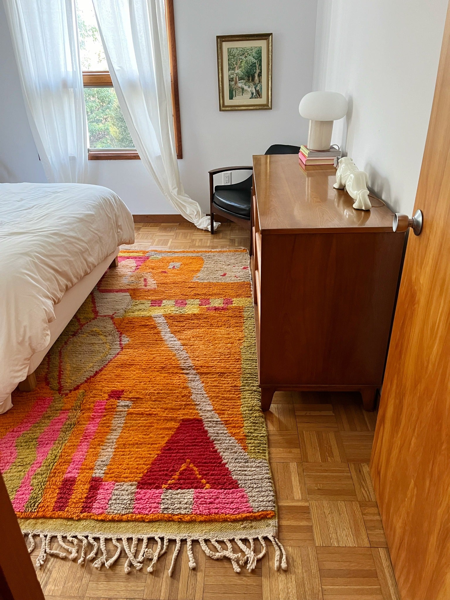 Bright colored rugs Moroccan style in bedroom