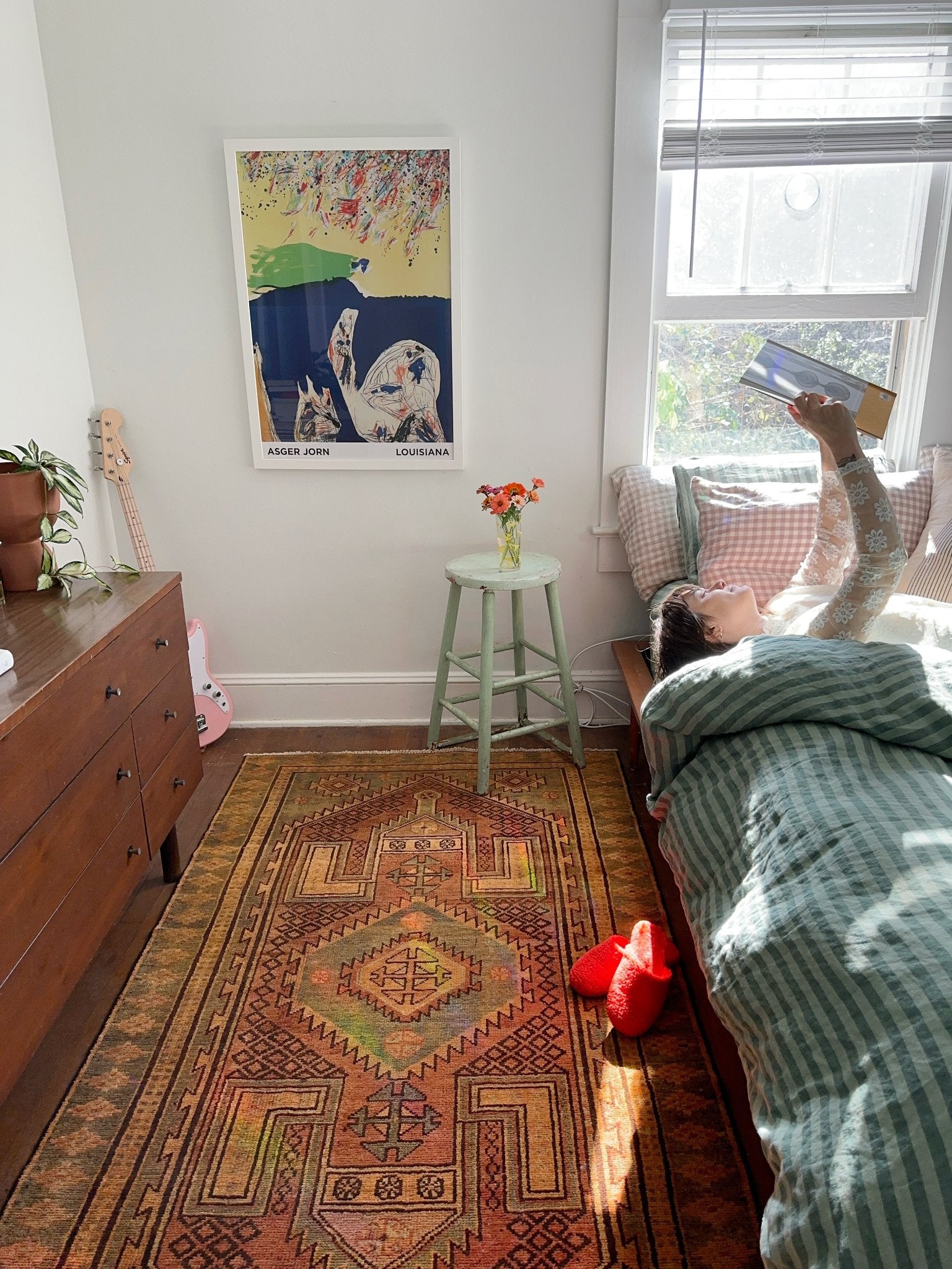 Style a Muted Earth Toned Rug in a Bedroom