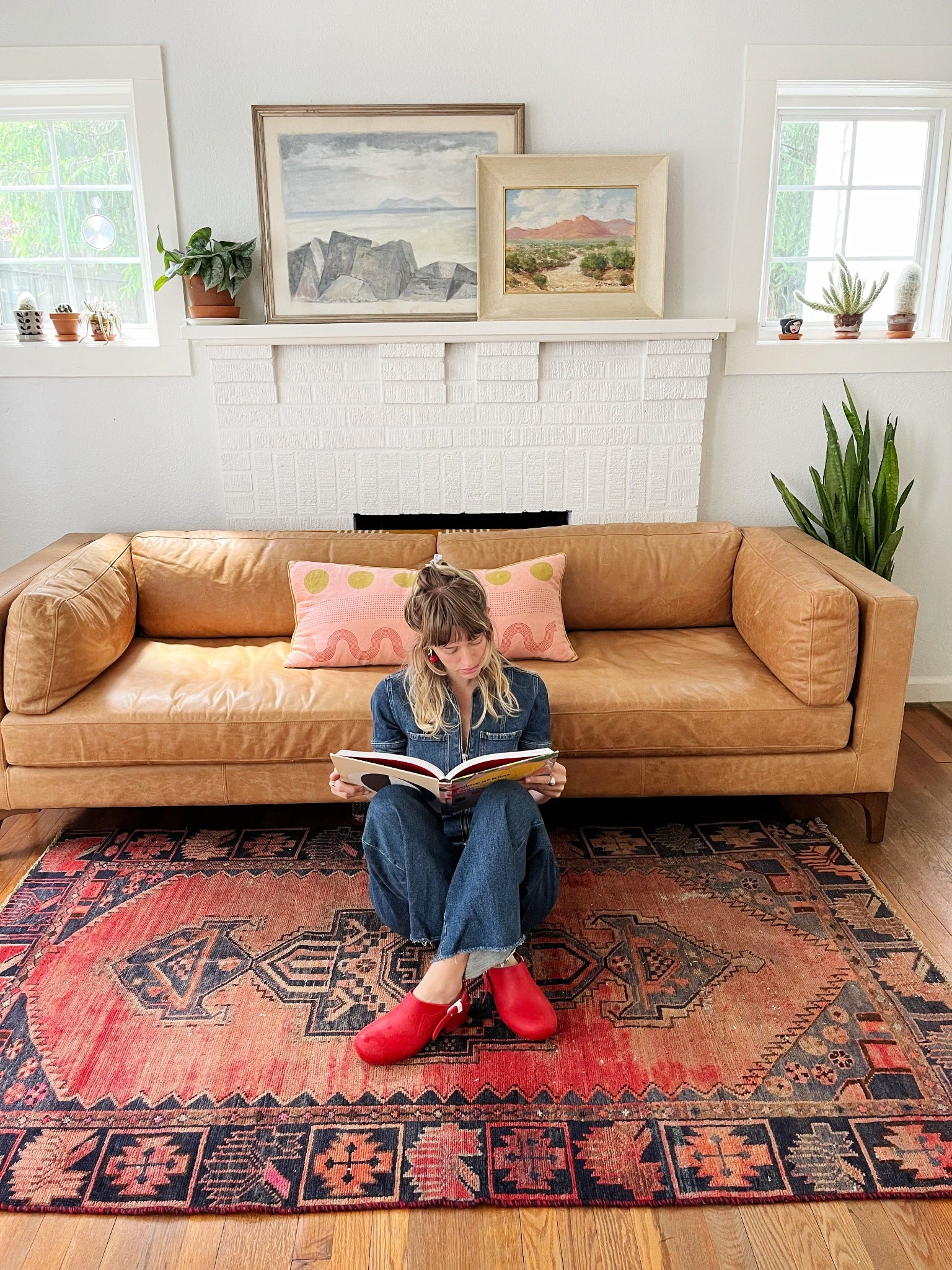 See Vintage Persian Red Rug in a Living Room