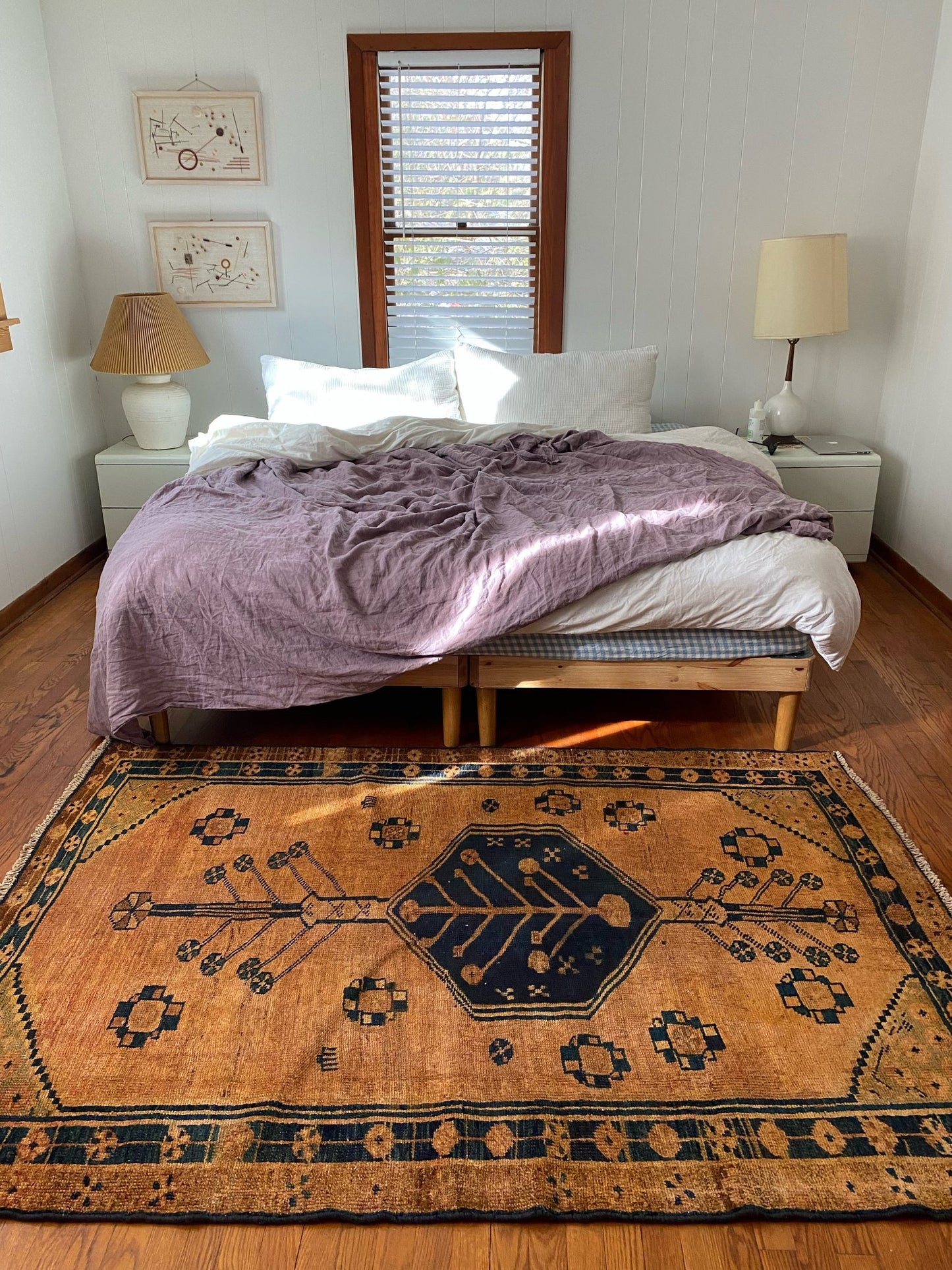 Vintage Pink Terracotta Persian Rug Styled in a Bedroom