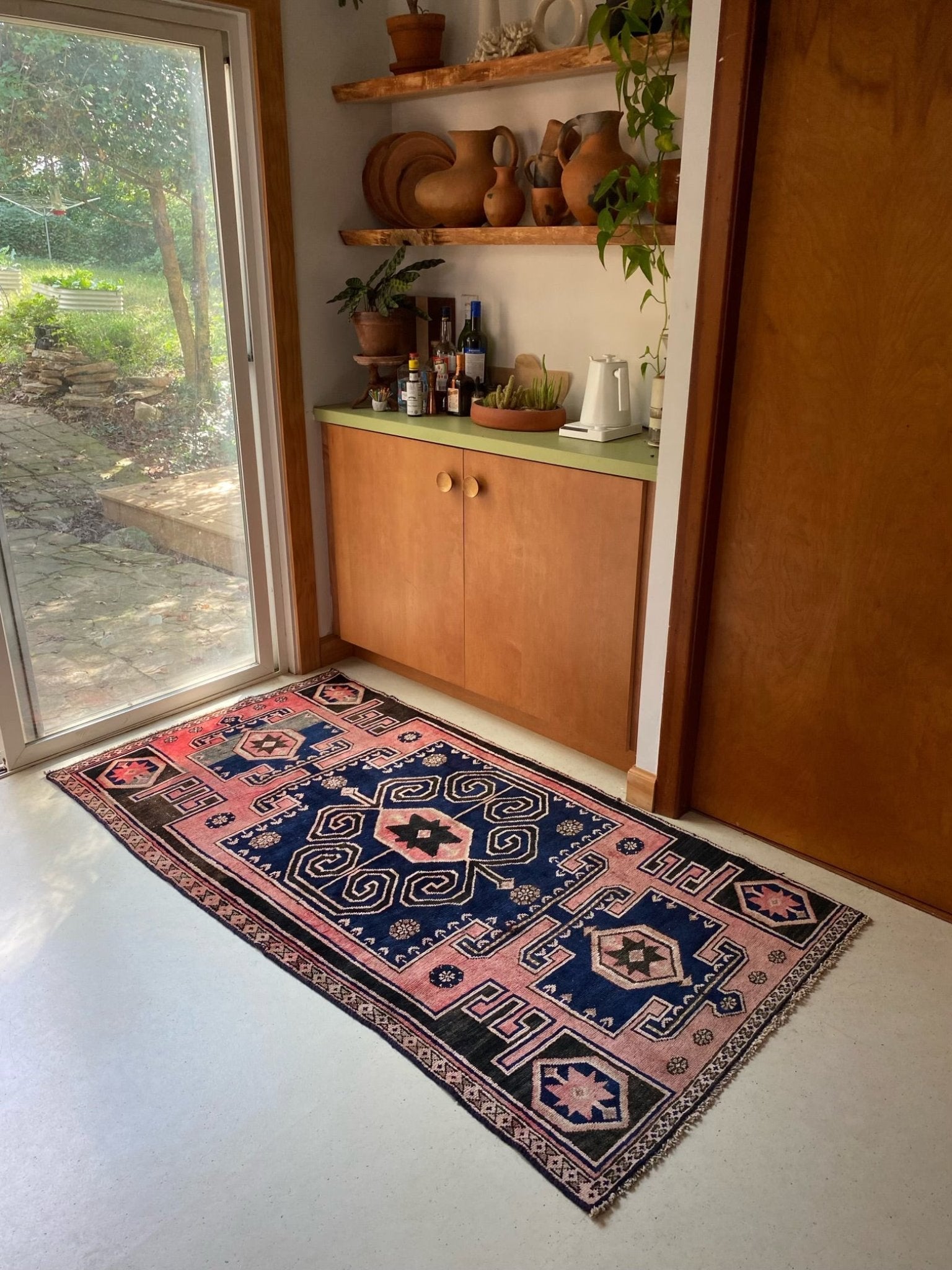 Style a Home Bar with a Vintage Pink and Indigo Vintage Rug