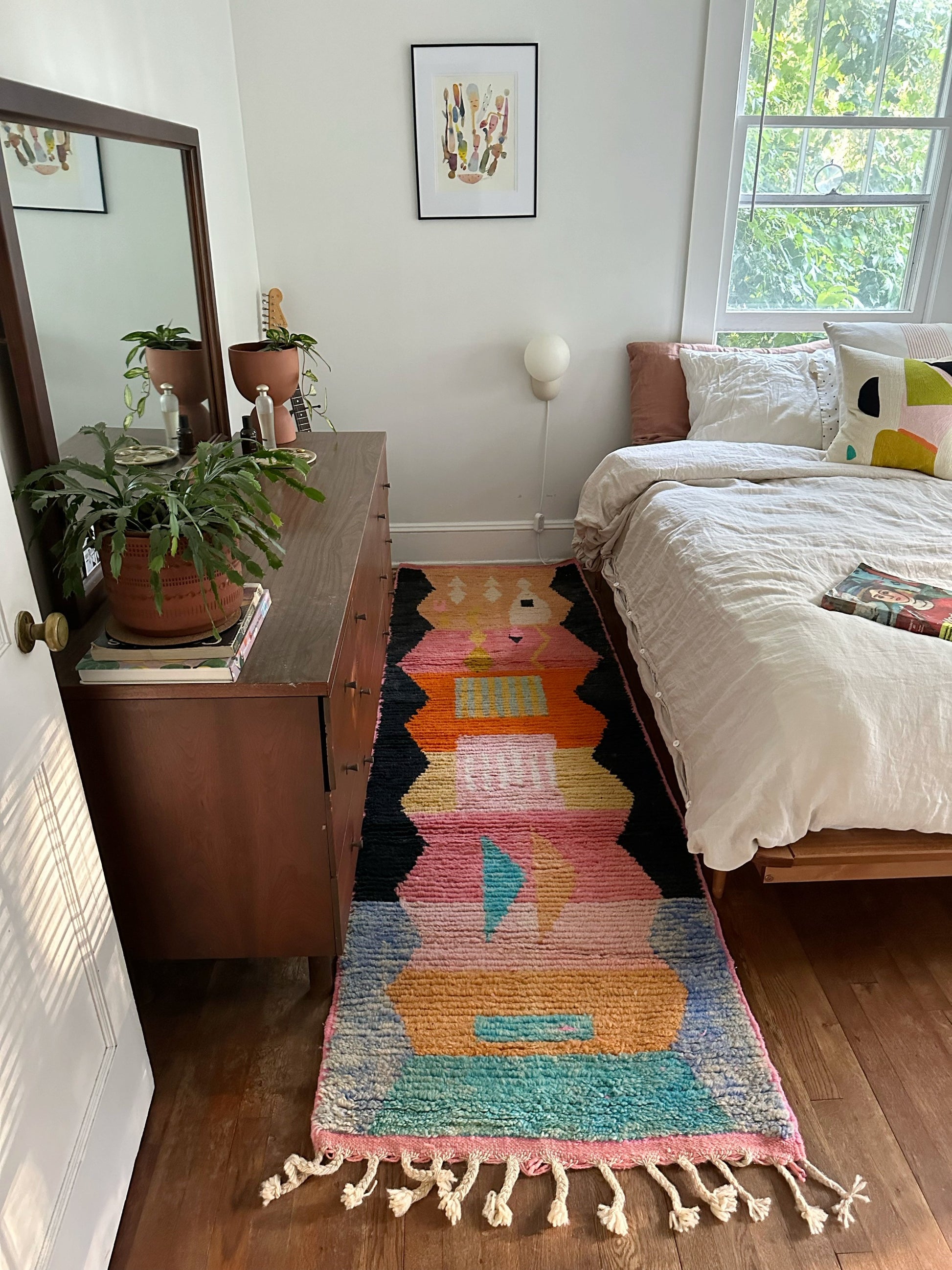 A colorful runner bedside is perfect in the evening light