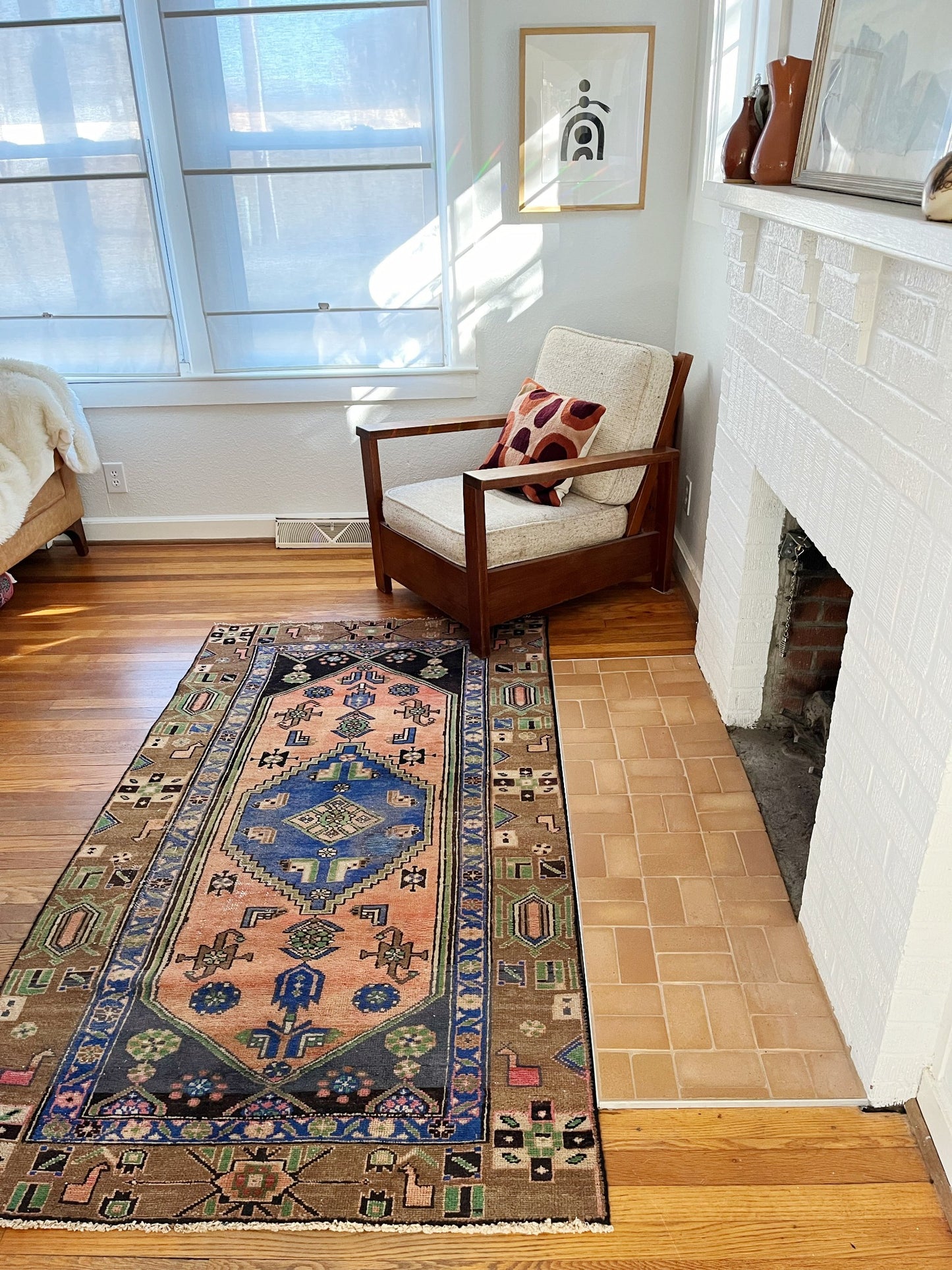 Style Cati Persian Rug in front of a Fireplace