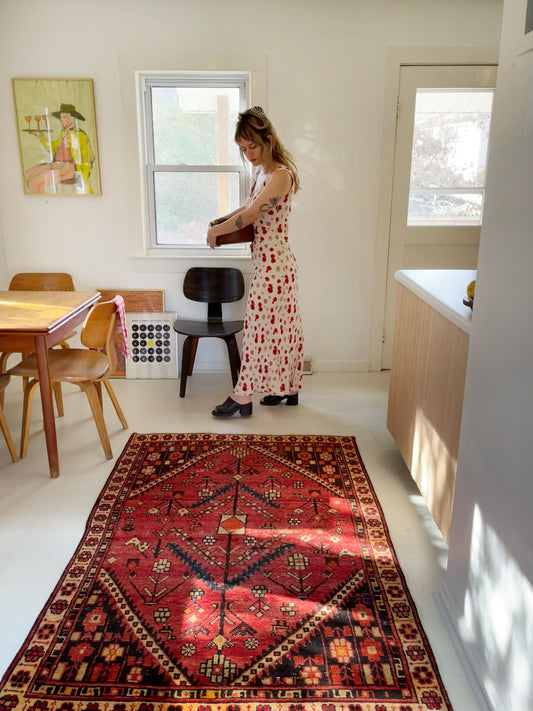 Style a Red Vintage Persian Rug in a Dining Room