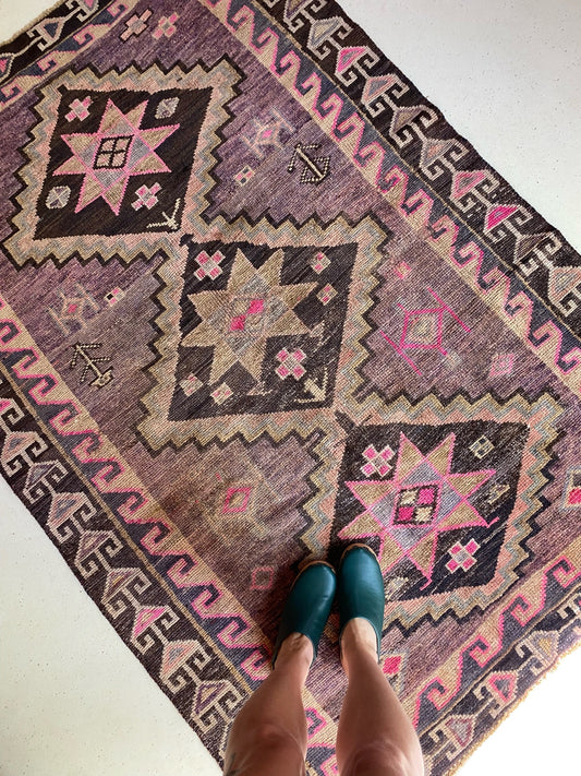 See Purple and Pink Vintage Rug