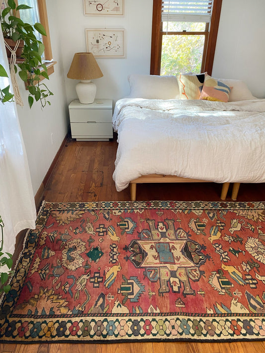 Define a Bedroom Space with a Vintage Persian Area Rug