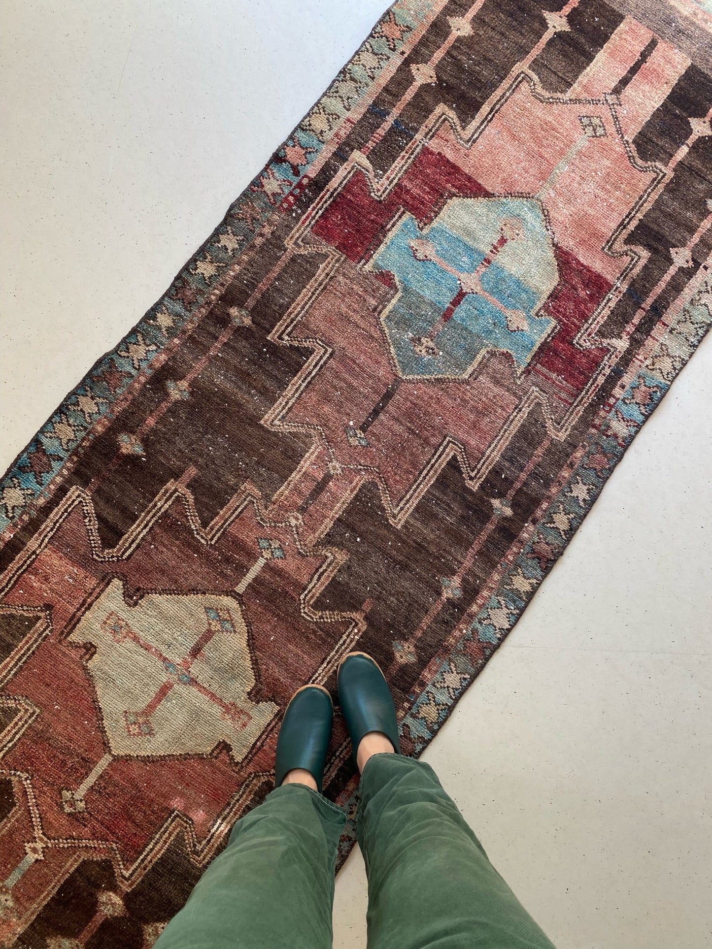 See Brown and Blue Color Variations on Vintage Runner Rug