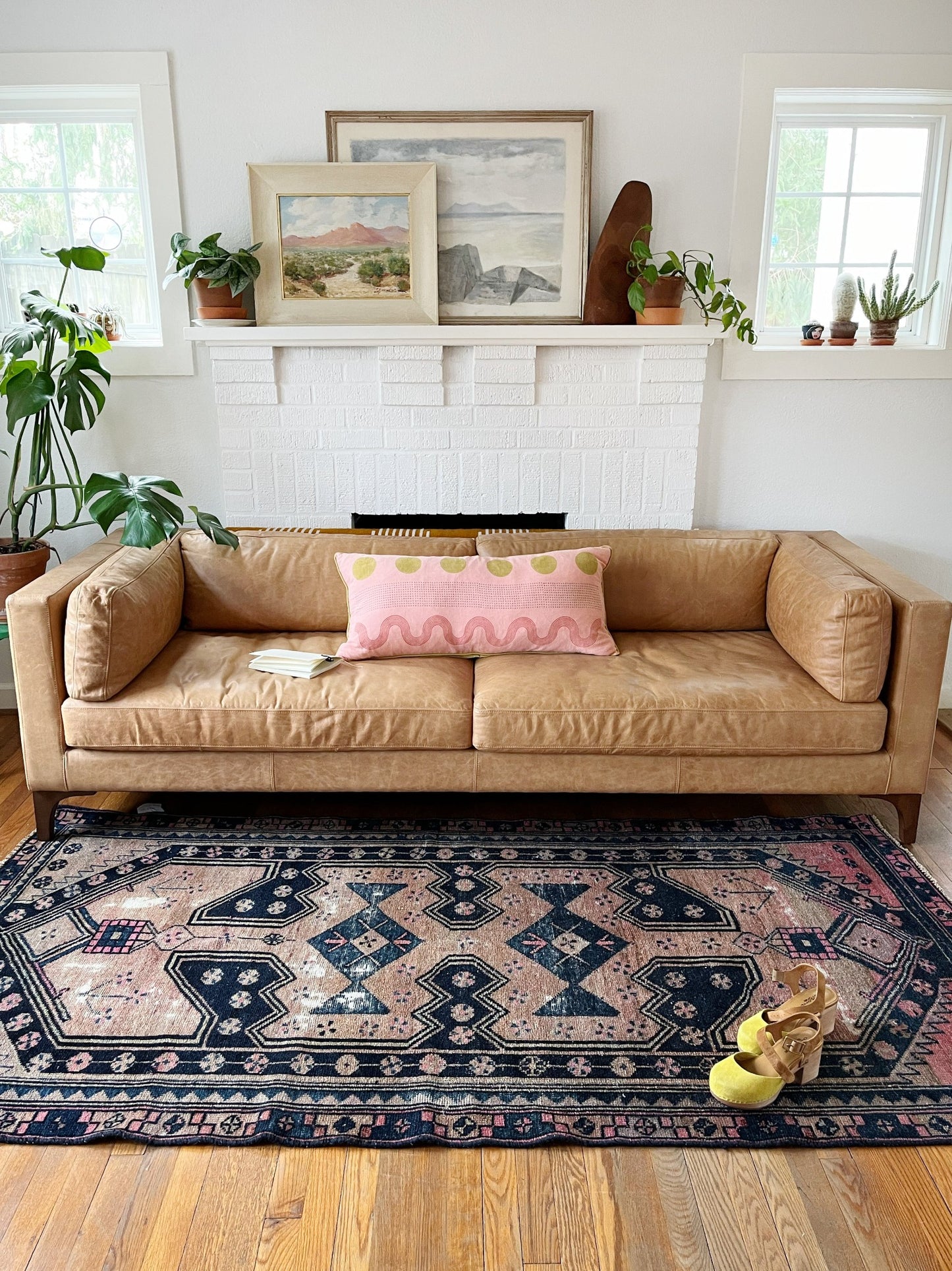 Style Vintage Arbor Persian Rug by a Modern Leather Couch