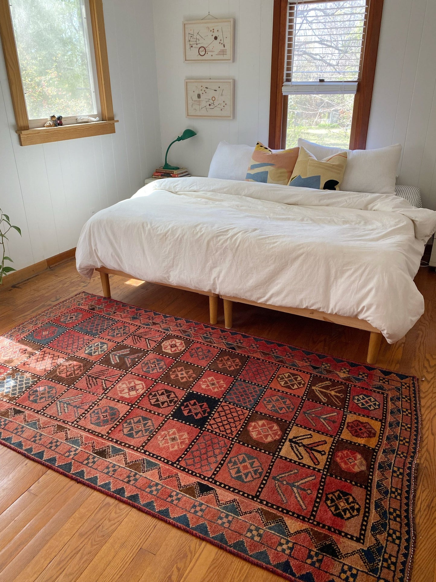 See Diavola Vintage Persian Rug with a King Size Bed