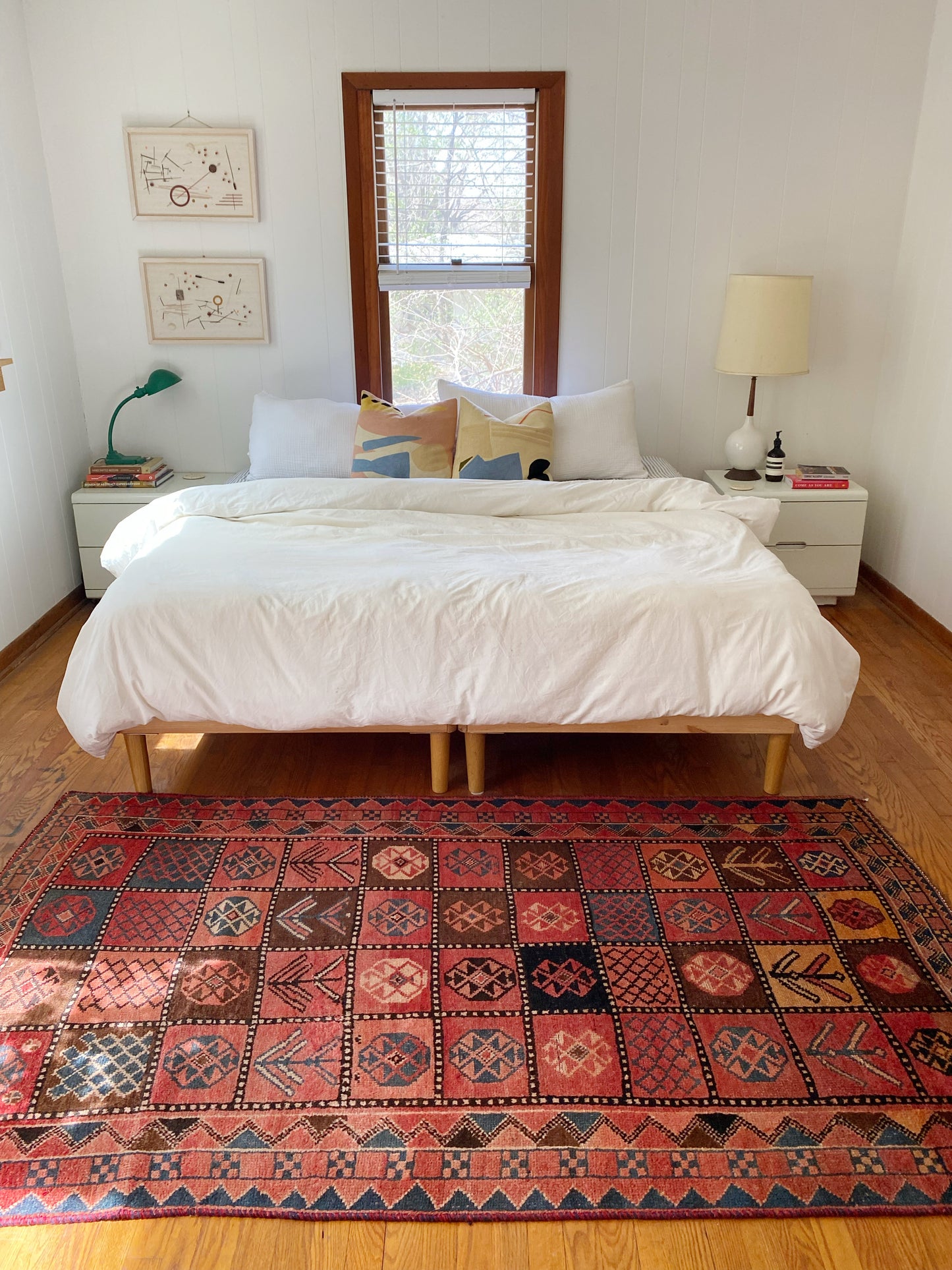 See Diavola Vintage Persian Rug at the Foot of a Bed