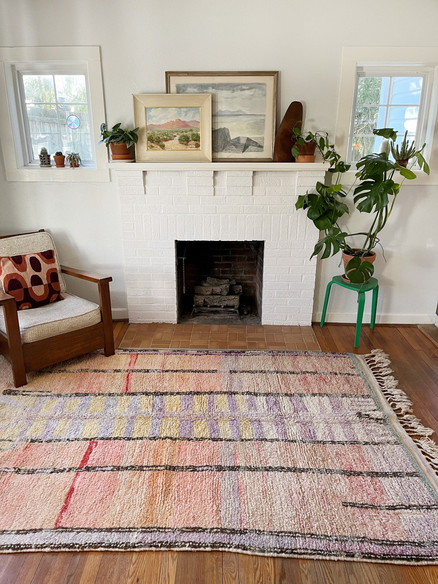 See Laures multi color Moroccan Rug Styled in a Living Room