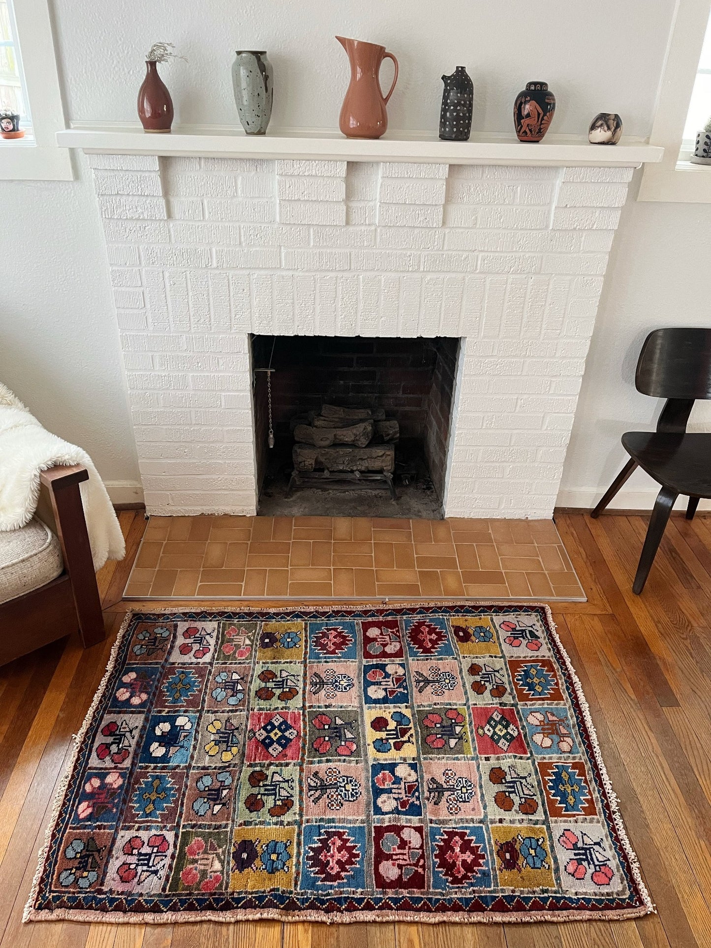 Style Danli Persian Rug by the Fireplace
