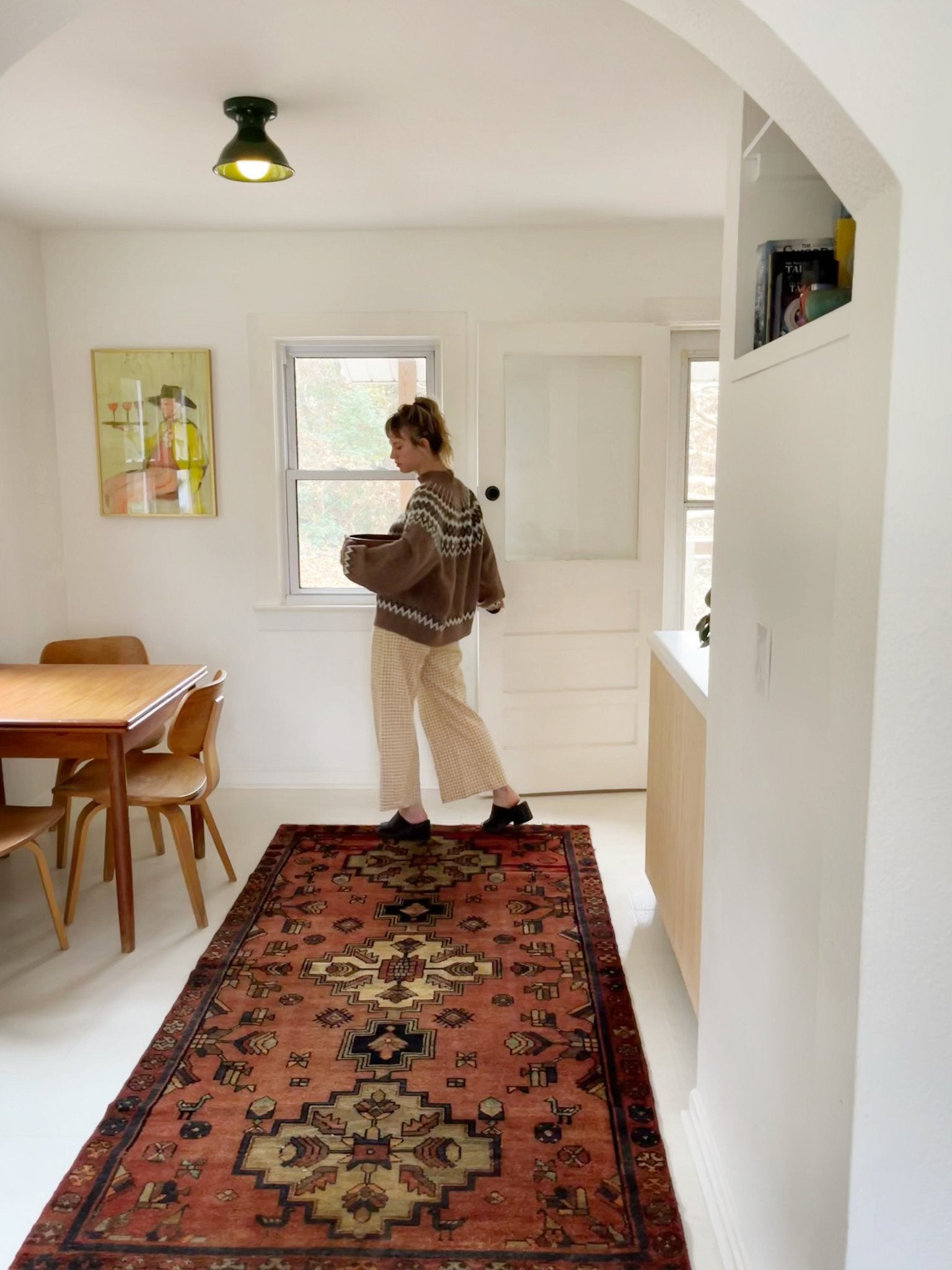 Style a Dining Room with a Vintage Terracotta Persian Rug