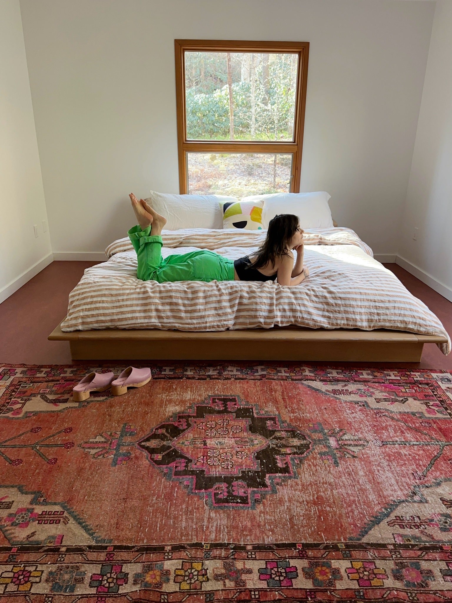 See Solanum Persian Rug Styled at the Foot of a Bed