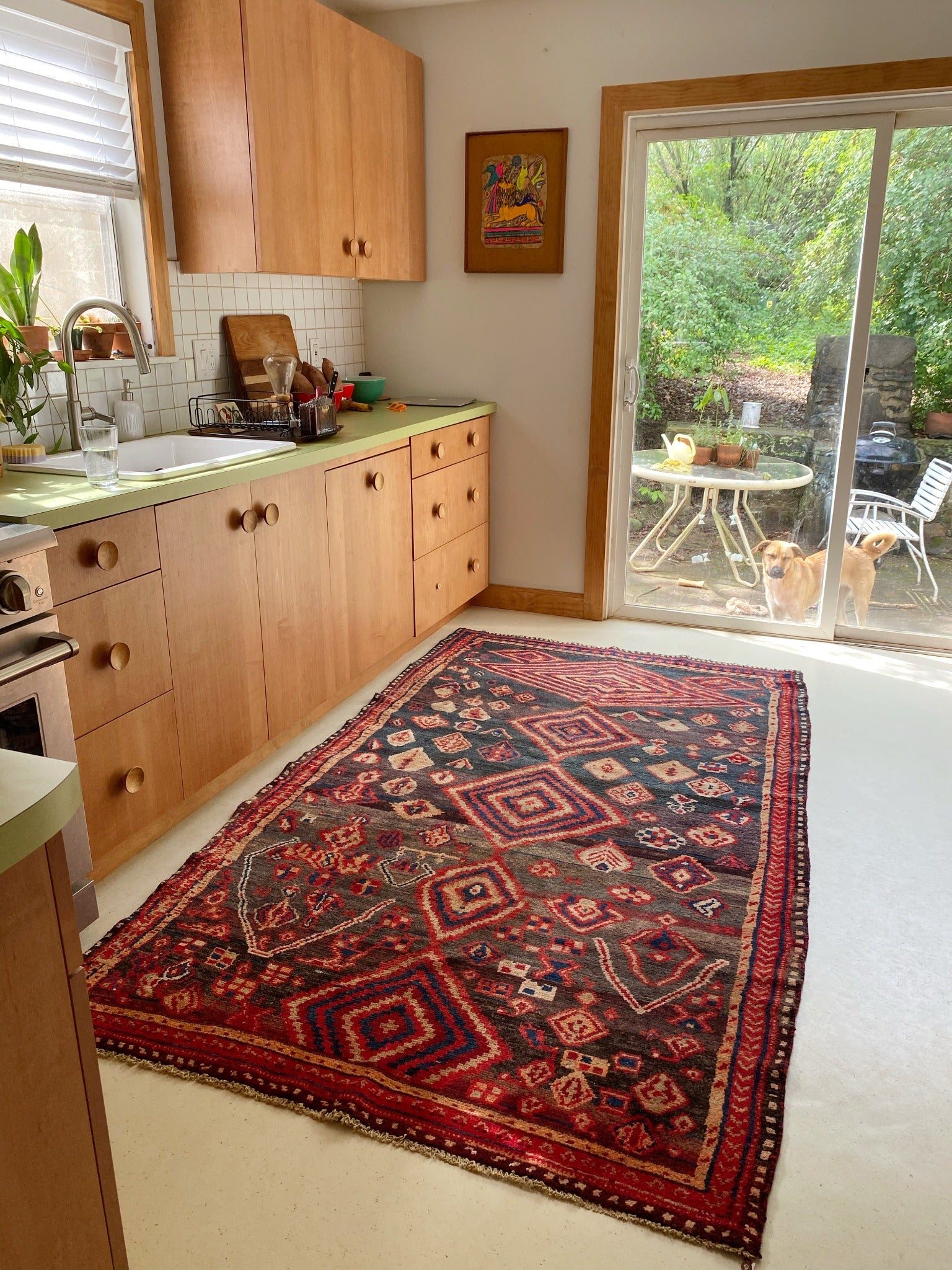 Style Moore Vintage Persian Black Rug in a Kitchen