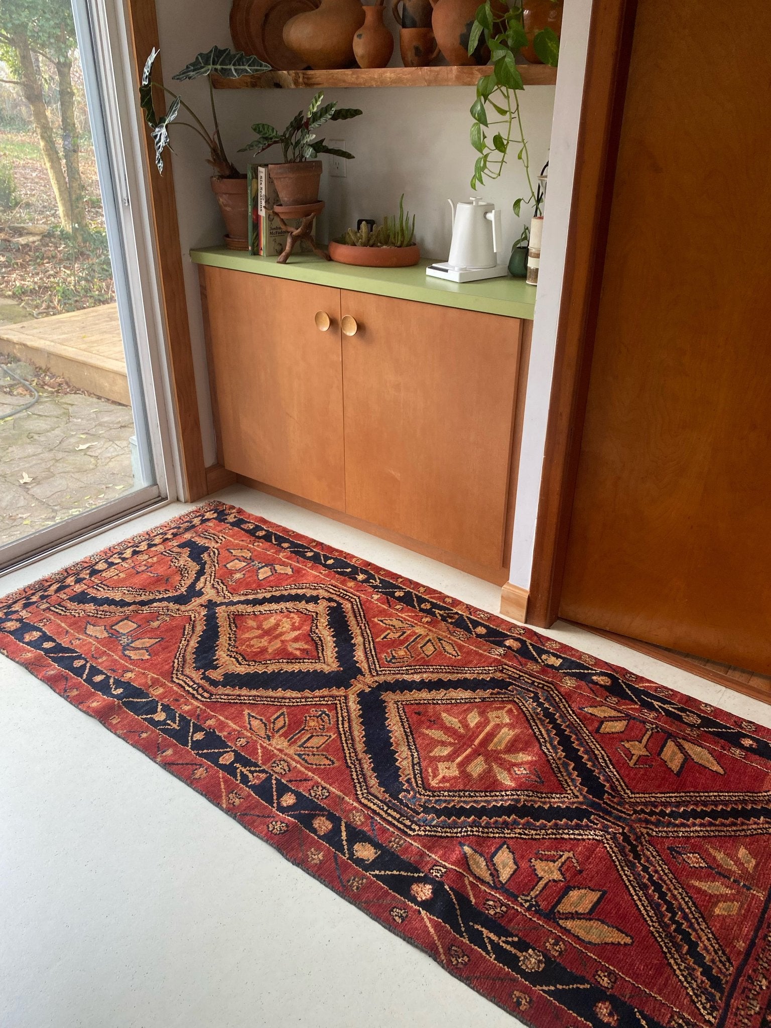 Enhance a Kitchen Bar with a Vintage Red Runner Rug