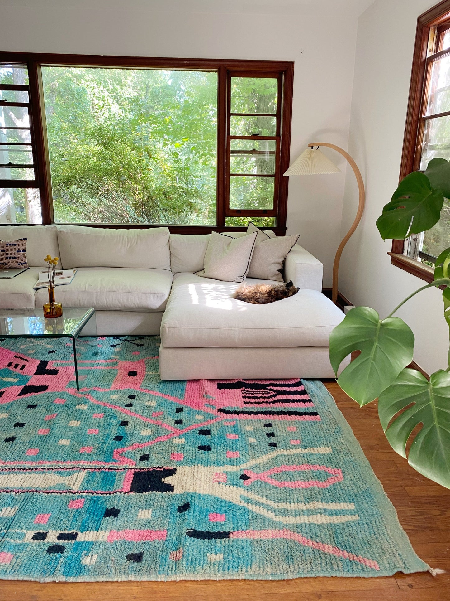 Soft blue and pink woven in a large Moroccan area rug