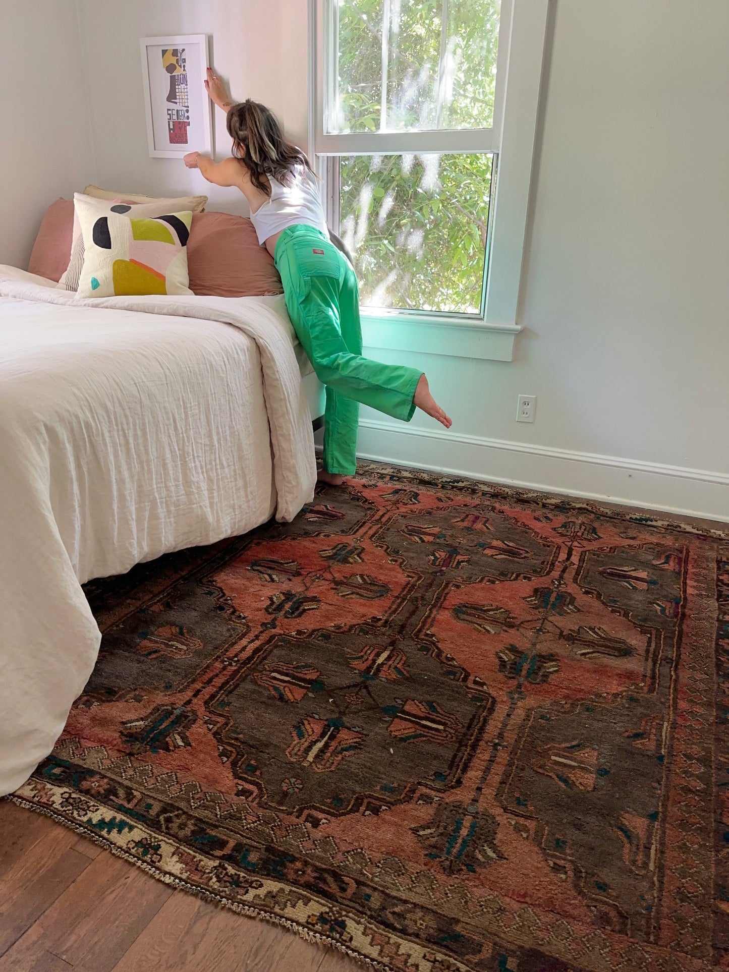 Copper Persian rug is so soft underfoot in a bright bedroom | Lost Hunt Vintage
