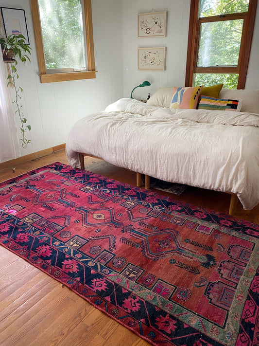Style Petal Persian Rug in a Bedroom