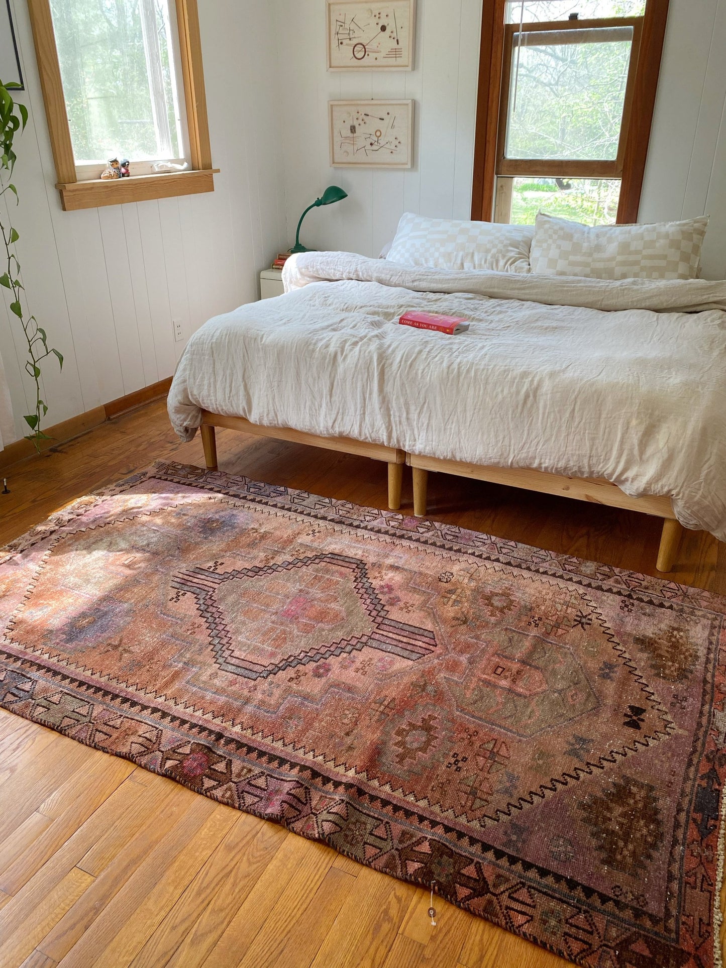 Vintage Persian Area Rug in a Bedroom