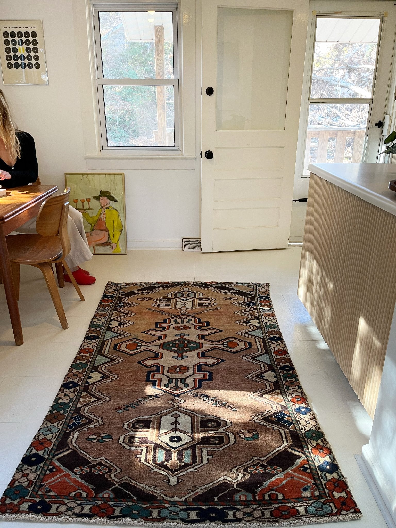 Enhance a Dining Room Space with a Vintage Persian Rug