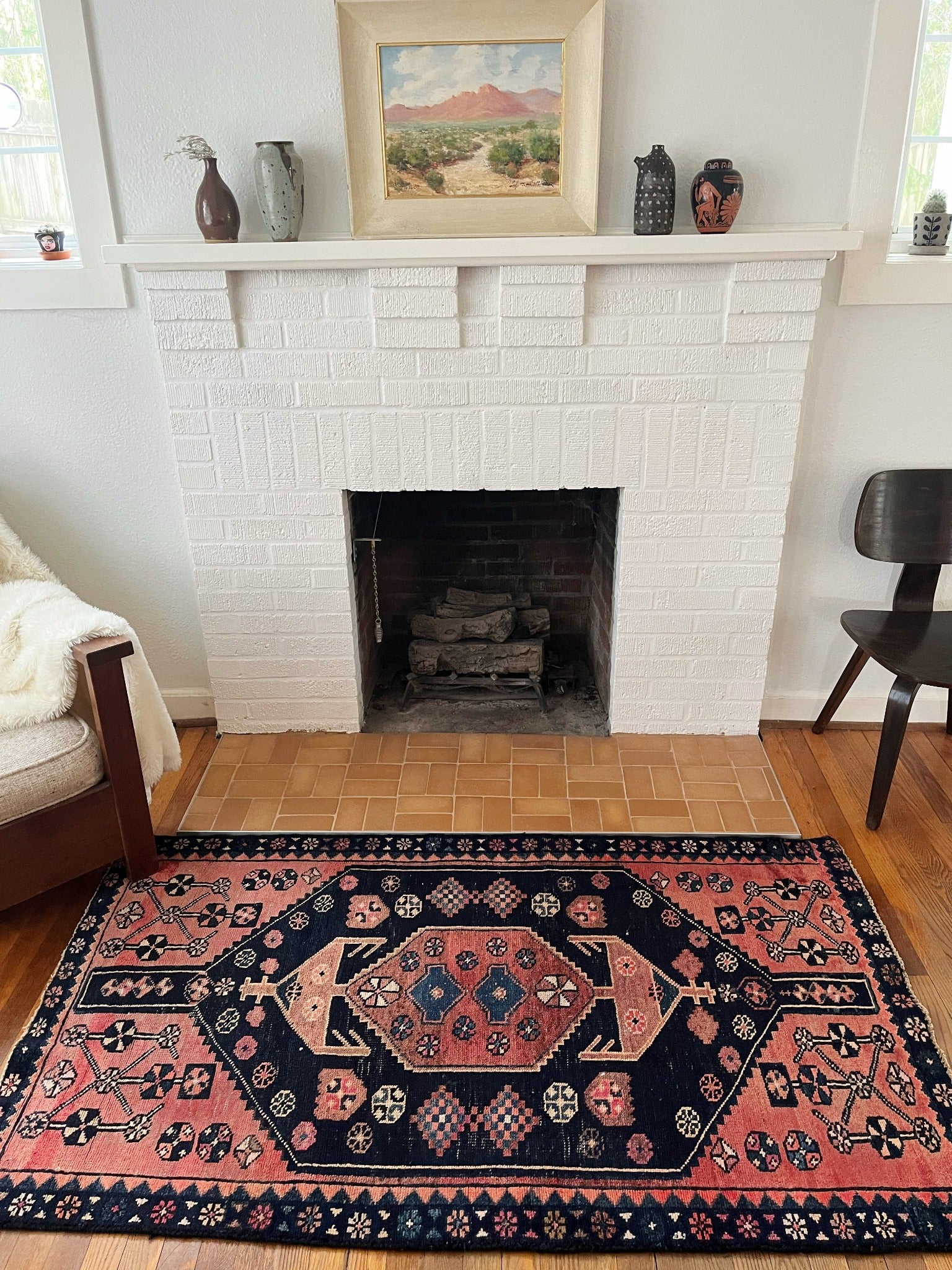 See Ceiba Persian Rug by a Fireplace