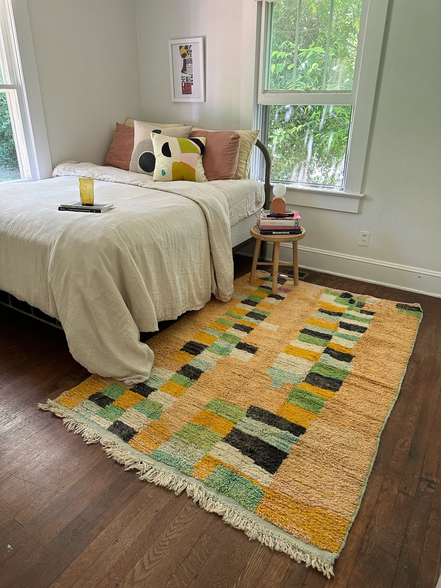 Abstract checks make Ezelle Moroccan Rug a fun choice in a bedroom.