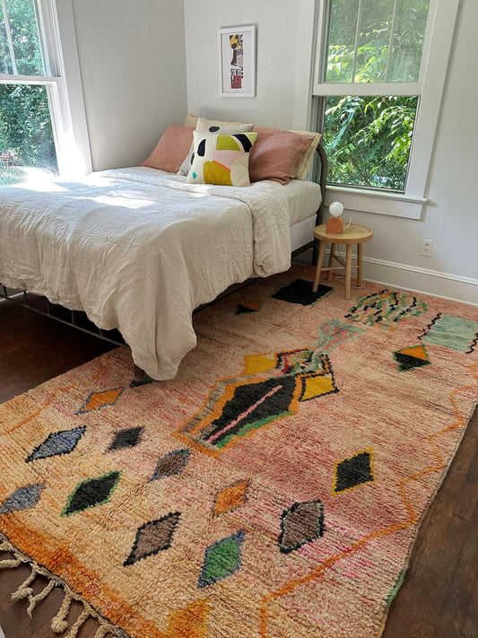 Clay Moroccan rug makes a room beautiful in the morning light